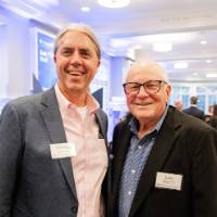 Guests smile during the Award Dinner